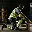 REBEL-Tech-Gear-NightGlo-Lime-and-Gun-Metal-Kneeled-Moving-Beam-300x300.webp